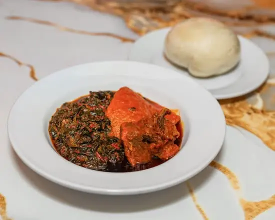 Efo riro vegetable soup with assorted meats at Bisi Kitchen